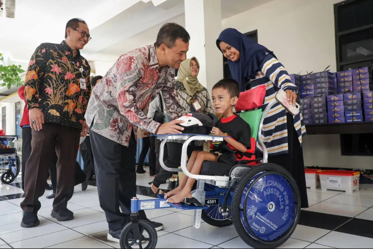 Bantuan kursi roda adaptif